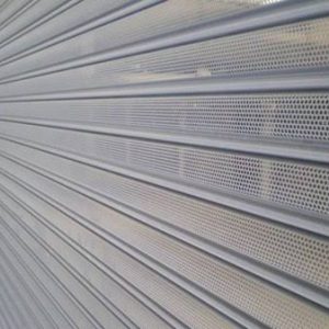 Perforated roller shutter door